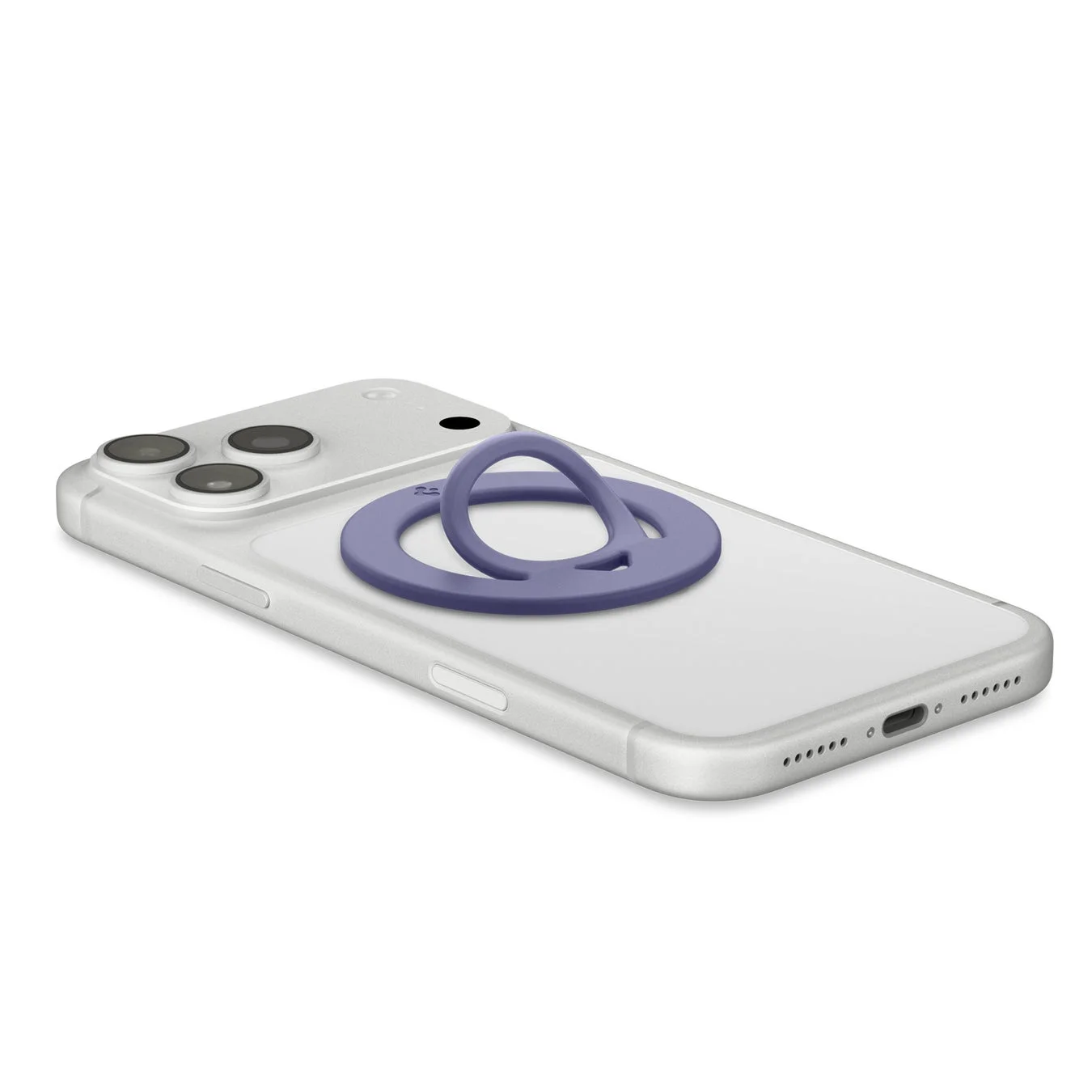 透明なケースを装着したシルバーのスマートフォンが白い背景に置かれており、その背面にパープルカラーのリング型スマホグリップが取り付けられています。このアクセサリーは、スマートフォンの持ちやすさを向上させ、スタンドとしても機能します。