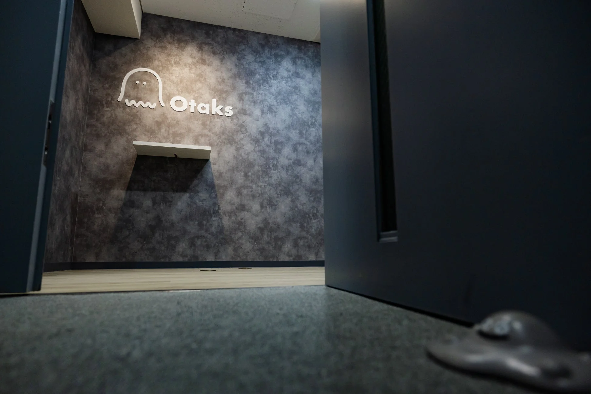 Otaksの壁のロゴ