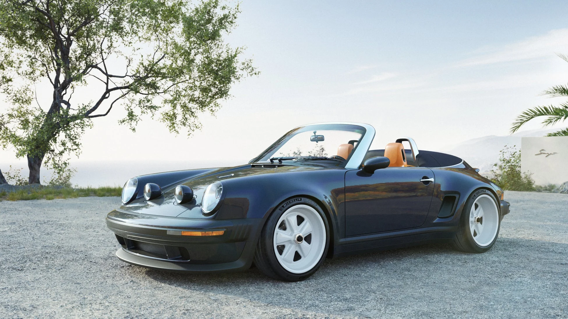 パシフィックブルーのカスタムポルシェ911カブリオレ