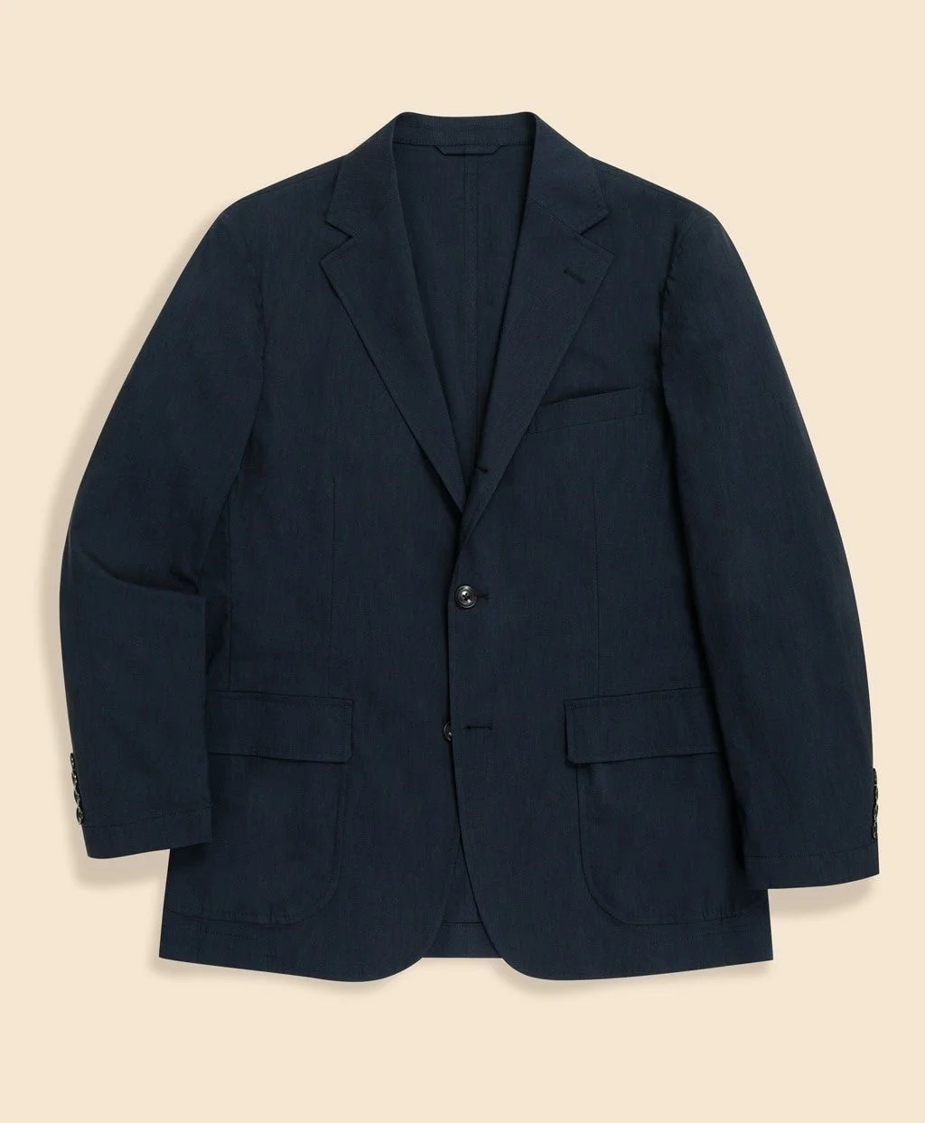 ネイビーのテーラードジャケット